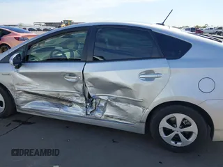 2015 Toyota Prius Four with VIN JTDKN3DU2F1899374, listed as a IAAI auction lot 42147786 with 136,787 mi miles and . Bid and sale history available at DreamBid. Image 14.
