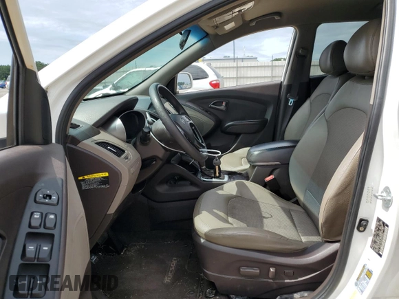 2015 Hyundai Tucson GLS with VIN KM8JT3AF4FU105959, listed as a Copart auction lot 62782944 with 156,733 mi miles and Salvage Title. Bid and sale history available at DreamBid. Image 7.