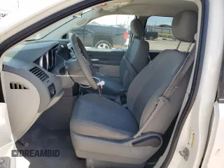 2009 Dodge Grand Caravan SE with VIN 1D8HN44E29B509835, listed as a Copart auction lot 56311925 with 105,108 mi miles and Salvage title. Bid and sale history available at DreamBid. Image 7.