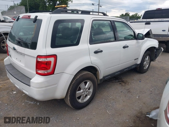 2008 Ford Escape XLS with VIN 1FMCU02Z58KA71929, listed as a IAAI auction lot 42612725 with 164,092 mi miles and . Bid and sale history available at DreamBid. Image 4.