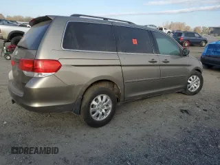 2009 Honda Odyssey EX-L with VIN 5FNRL38649B413532, listed as a Copart auction lot 79867014 with 308,701 mi miles and Salvage Title. Bid and sale history available at DreamBid. Image 3.