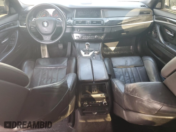 2014 BMW M5 with VIN WBSFV9C54ED097462, listed as a Copart auction lot 70482504 with 76,501 mi miles and Clean Title. Bid and sale history available at carsss.com. Image 8.
