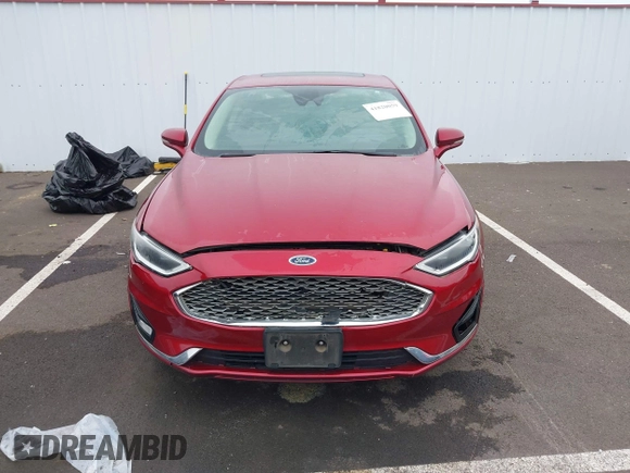 2019 Ford Fusion Titanium with VIN 3FA6P0K98KR179513, listed as a IAAI auction lot 41820059 with 112,155 mi miles. Bid and sale history available at carsss.com. Image 12.