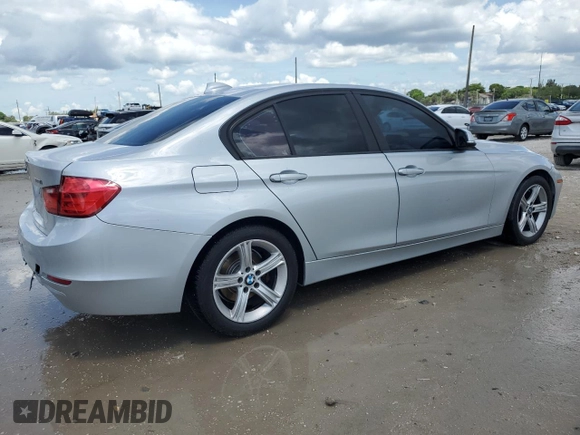 2013 BMW 3 Series 328i with VIN WBA3C1G52DNR49440, listed as a Copart auction lot 61546685 with 118,308 mi miles and Salvage title. Bid and sale history available at DreamBid. Image 3.