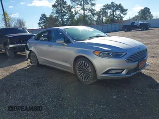 2018 Ford Fusion Titanium with VIN 3FA6P0RU1JR132316, listed as a IAAI auction lot 41240270 with 145,088 mi miles and . Bid and sale history available at DreamBid. Image 1.