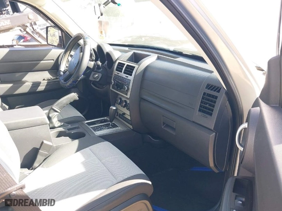 2007 Dodge Nitro SXT with VIN 1D8GU28K87W581969, listed as a IAAI auction lot 42036088 with 128,382 mi miles. Bid and sale history available at carsss.com. Image 5.