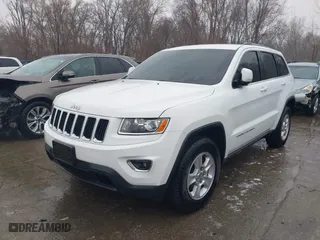 2014 Jeep Grand Cherokee Laredo with VIN 1C4RJEAG0EC510545, listed as a IAAI auction lot 41434776 with 141,789 mi miles. Bid and sale history available at carsss.com. Image 2.