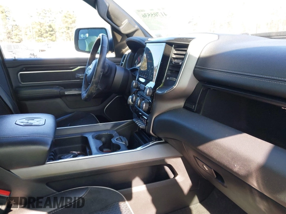 2022 Ram 1500 Laramie with VIN 1C6SRFJTXNN237199, listed as a IAAI auction lot 41705536 with 35,143 mi miles and . Bid and sale history available at DreamBid. Image 5.