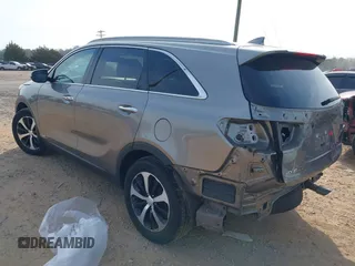 2017 Kia Sorento EX with VIN 5XYPHDA11HG277686, listed as a IAAI auction lot 41790097 with 70,799 mi miles and . Bid and sale history available at carsss.com. Image 3.