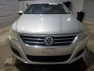 2012 Volkswagen CC Sport with VIN WVWMN7AN7CE509712, listed as a Copart auction lot 51003085 with 127,932 mi miles and Salvage Title. Bid and sale history available at DreamBid. Image 5.