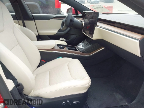 2022 Tesla Model S with VIN 5YJSA1E58NF470737, listed as a IAAI auction lot 42035040 with 15,224 mi miles and . Bid and sale history available at DreamBid. Image 5.