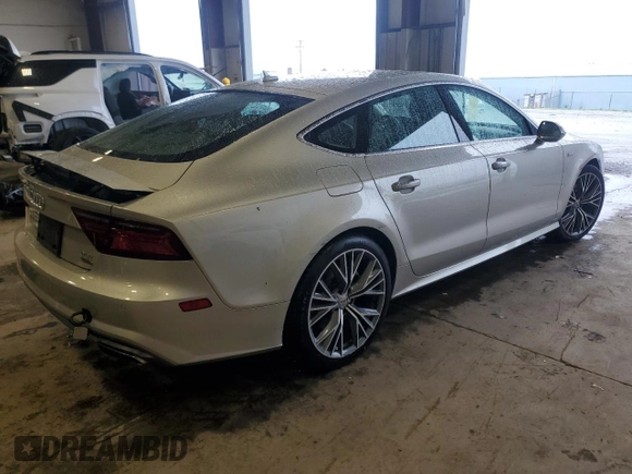 2018 Audi A7 Premium Plus with VIN WAUW3AFC1JN032336, listed as a Copart auction lot 58100635 with 36,976 mi miles and Salvage title. Bid and sale history available at DreamBid. Image 3.