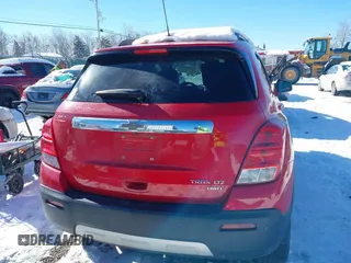 2016 Chevrolet Trax LTZ with VIN KL7CJRSB3GB569465, listed as a IAAI auction lot 41271637 with 152,503 mi miles. Bid and sale history available at carsss.com. Image 16.