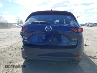 2020 Mazda CX-5 Grand Touring with VIN JM3KFBDM2L0768770, listed as a IAAI auction lot 41695058 with 44,192 mi miles. Bid and sale history available at carsss.com. Image 15.
