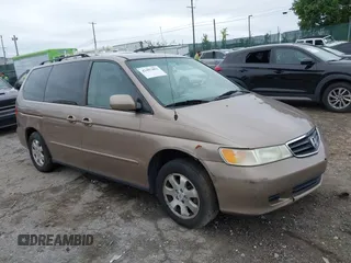 2004 Honda Odyssey EX-L with VIN 5FNRL18034B073699, listed as a IAAI auction lot 42457803 with 197,980 mi miles and . Bid and sale history available at DreamBid. Image 1.