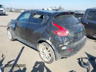 2014 Nissan Juke S with VIN JN8AF5MR1ET450940, listed as a IAAI auction lot 38801607 with 157,565 mi miles. Bid and sale history available at carsss.com. Image 3.