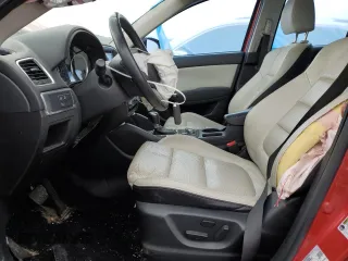 2016 Mazda CX-5 Grand Touring with VIN JM3KE2DY5G0692554, listed as a Copart auction lot 51322475 with 128,086 mi miles and Salvage Title. Bid and sale history available at carsss.com. Image 7.