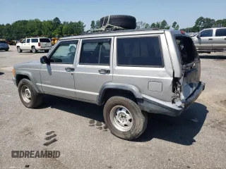 2000 Jeep Cherokee with VIN 1J4FN28S6YL210944, listed as a Copart auction lot 65163475 with 147,609 mi miles and Salvage title. Bid and sale history available at DreamBid. Image 2.