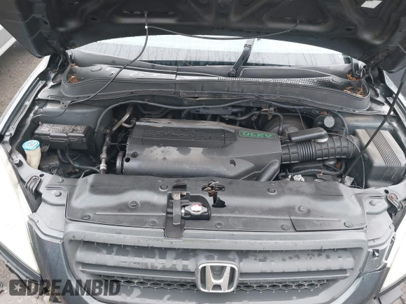 2003 Honda Pilot LX with VIN 2HKYF181X3H610581, listed as a IAAI auction lot 41743077 with 212,207 mi miles and . Bid and sale history available at DreamBid. Image 10.