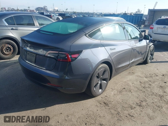 2023 Tesla Model 3 with VIN 5YJ3E1EA5PF697201, listed as a IAAI auction lot 41589422 with 16,862 mi miles and . Bid and sale history available at carsss.com. Image 4.