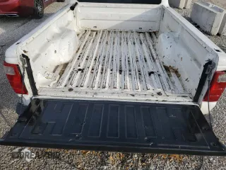 2002 Ford Ranger XL with VIN 1FTYR10DX2TA66722, listed as a Copart auction lot 54425765 with 246,813 mi miles and Non repairable. Bid and sale history available at DreamBid. Image 10.