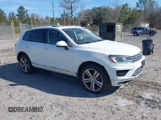 2016 Volkswagen Touareg Sport with VIN WVGEF9BP5GD012680, listed as a IAAI auction lot 41610943 with 153,952 mi miles and . Bid and sale history available at DreamBid. Image 1.