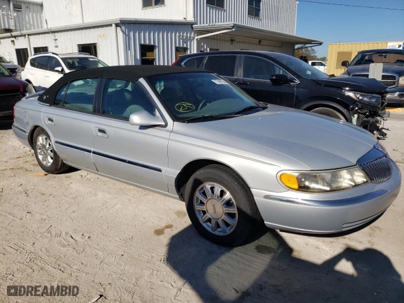 2001 Lincoln Continental with VIN 1LNHM97V31Y641106, listed as a Copart auction lot 77468194 with 86,363 mi miles and Clean Title. Bid and sale history available at carsss.com. Image 4.
