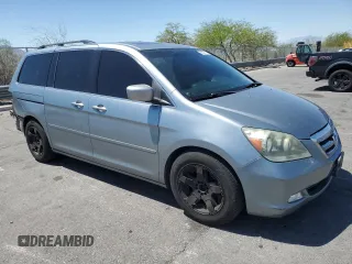 2005 Honda Odyssey Touring z VIN 5FNRL38805B131416, wystawiony jako Copart lot #59157395 z przebiegiem 263 087 mil mil oraz Szkoda całkowita • Salvage title. Historia ofert i sprzedaży dostępna na DreamBid. Obrazek 4.