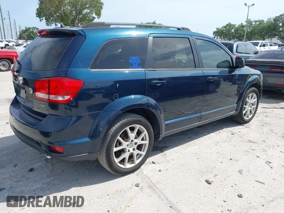 2014 Dodge Journey SXT with VIN 3C4PDCBG3ET218328, listed as a IAAI auction lot 42086656 with 55,620 mi miles. Bid and sale history available at carsss.com. Image 4.