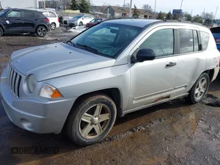 2008 Jeep Compass Sport with VIN 1J8FF47W58D703312, listed as a IAAI auction lot 41693818 with 156,161 mi miles. Bid and sale history available at carsss.com. Image 2.