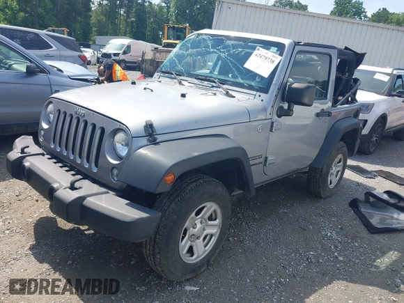 2014 Jeep Wrangler Sport with VIN 1C4AJWAG6EL192448, listed as a IAAI auction lot 42479738 with 44,848 mi miles and . Bid and sale history available at DreamBid. Image 2.