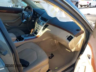 2011 Cadillac CTS Luxury with VIN 1G6DE5EY5B0154563, listed as a IAAI auction lot 36806985 with 92,635 mi miles and . Bid and sale history available at DreamBid. Image 5.
