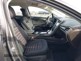 2013 Ford Fusion SE Hybrid with VIN 3FA6P0LU4DR267643, listed as a IAAI auction lot 41846681 with 148,002 mi miles. Bid and sale history available at carsss.com. Image 5.