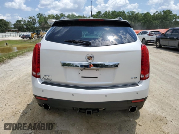 2014 Cadillac SRX Luxury Collection z VIN 3GYFNBE30ES685072, wystawiony jako Copart lot #58122705 z przebiegiem 128 013 mil mil oraz Szkoda całkowita • Salvage title. Historia ofert i sprzedaży dostępna na DreamBid. Obrazek 6.