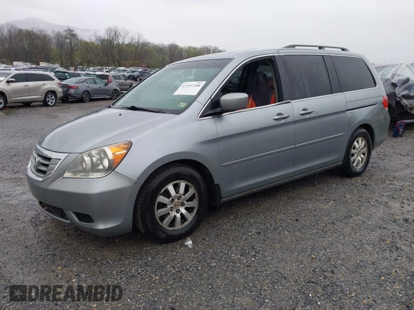 2009 Honda Odyssey EX-L with VIN 5FNRL387X9B043289, listed as a IAAI auction lot 41951208 with 197,184 mi miles and . Bid and sale history available at DreamBid. Image 2.
