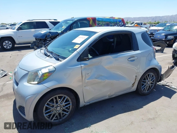 2014 Scion iQ with VIN JTNJJXB02EJ027026, listed as a IAAI auction lot 42619439 with 103,261 mi miles and . Bid and sale history available at DreamBid. Image 2.
