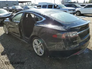2014 Tesla Model S 60 with VIN 5YJSA1H10EFP58650, listed as a Copart auction lot 45325375 with 105,603 mi miles and Salvage Title. Bid and sale history available at DreamBid. Image 2.