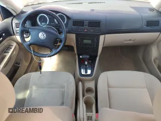 2004 Volkswagen Jetta GL with VIN 3VWRK69M34M076208, listed as a Copart auction lot 55482885 with 50,752 mi miles and Salvage title. Bid and sale history available at DreamBid. Image 8.
