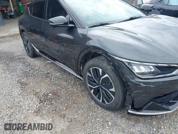 2022 Kia EV6 Wind z VIN KNDC3DLC5N5034625, wystawiony jako IAAI lot #42263100 z przebiegiem 35 412 mil mil oraz . Historia ofert i sprzedaży dostępna na DreamBid. Obrazek 6.
