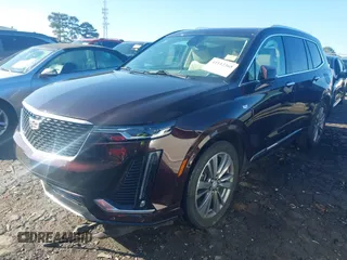 2021 Cadillac XT6 Premium Luxury with VIN 1GYKPDRS7MZ133561, listed as a IAAI auction lot 41112365 with 73,956 mi miles. Bid and sale history available at carsss.com. Image 2.