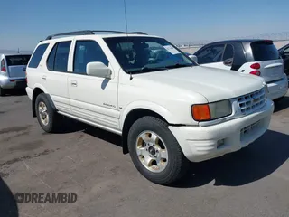 1999 Isuzu Rodeo S with VIN 4S2CK58W7X4325703, listed as a IAAI auction lot 42715480 with 205,420 mi miles and . Bid and sale history available at DreamBid. Image 6.