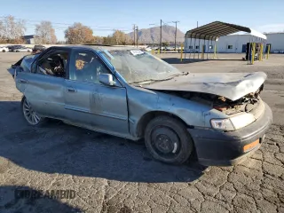 1995 Honda Accord EX w/Leather with VIN 1HGCD5665SA047372, listed as a Copart auction lot 41452345 with 0 mi miles and Salvage Title. Bid and sale history available at carsss.com. Image 4.