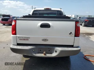 2002 Ford Explorer Sport Trac Value with VIN 1FMZU67E42UD15004, listed as a Copart auction lot 54129135 with 129,952 mi miles and Salvage title. Bid and sale history available at DreamBid. Image 6.