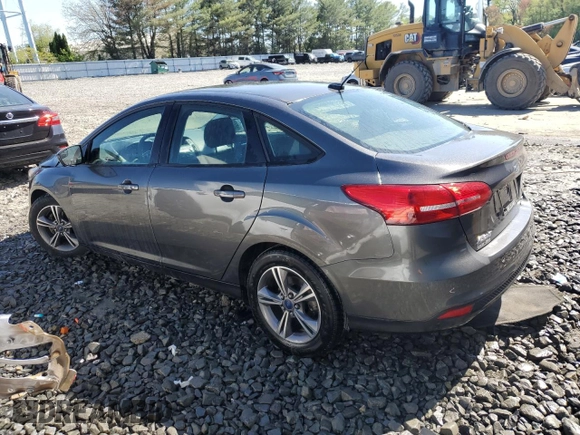 2018 Ford Focus SE with VIN 1FADP3FE5JL255010, listed as a Copart auction lot 54478335 with 118,074 mi miles and Salvage Title. Bid and sale history available at carsss.com. Image 2.