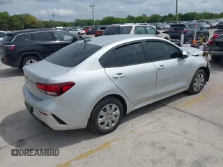 2021 Kia Rio LX with VIN 3KPA24AD1ME372886, listed as a IAAI auction lot 41876332 with 39,665 mi miles and . Bid and sale history available at DreamBid. Image 4.