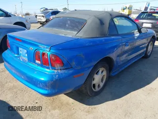 1998 Ford Mustang with VIN 1FAFP4448WF236496, listed as a IAAI auction lot 41408520 with 151,935 mi miles. Bid and sale history available at carsss.com. Image 4.