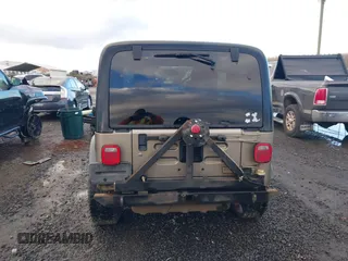 2004 Jeep Wrangler Sport with VIN 1J4FA49S94P711531, listed as a IAAI auction lot 41306863 with 143,720 mi miles and . Bid and sale history available at DreamBid. Image 17.