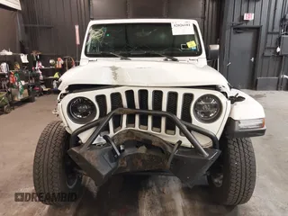 2021 Jeep Wrangler Unlimited Freedom with VIN 1C4HJXDNXMW681267, listed as a IAAI auction lot 42026181 with 40,143 mi miles and . Bid and sale history available at DreamBid. Image 6.