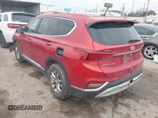 2019 Hyundai Santa Fe SE with VIN 5NMS2CAD5KH091985, listed as a IAAI auction lot 41471160 with 120,951 mi miles. Bid and sale history available at carsss.com. Image 3.