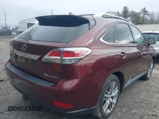 2015 Lexus RX 450h with VIN 2T2BC1BA0FC009674, listed as a IAAI auction lot 41847934 with 99,100 mi miles and . Bid and sale history available at DreamBid. Image 4.